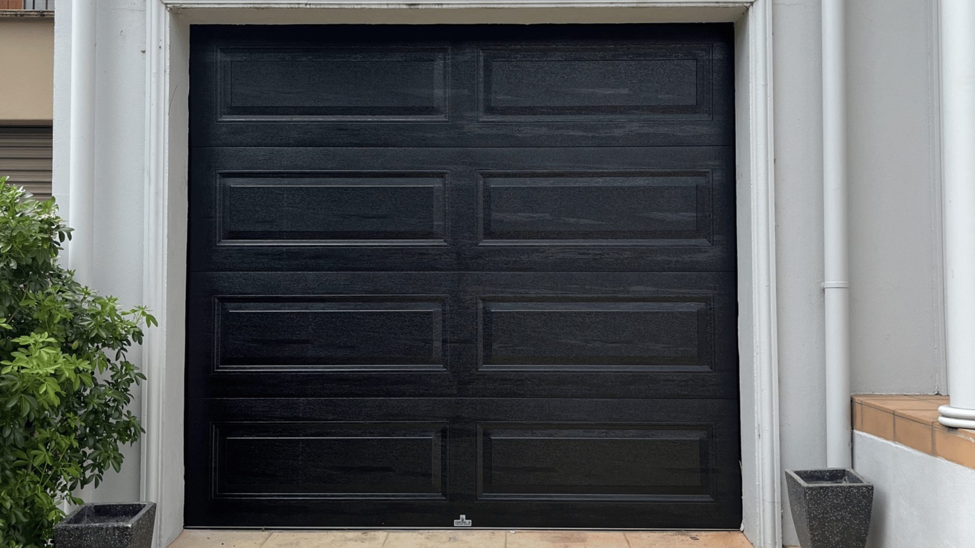 Sectional garage door